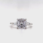 Load and play video in Gallery viewer, 3.00ct Asscher Cut Solitaire, Art Deco Asscher Diamond with side Baguette, Engagement Ring, Proposal Ring, Bridal Ring, Simulated Diamond