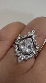 Load and play video in Gallery viewer, 3 Ring Pear Halo Ring Set, 1.00ct Pear Halo, Art Deco Pear Marquise Band, Teardrop Engagement Ring Set, Wedding Set Sterling Silver, Vermeil